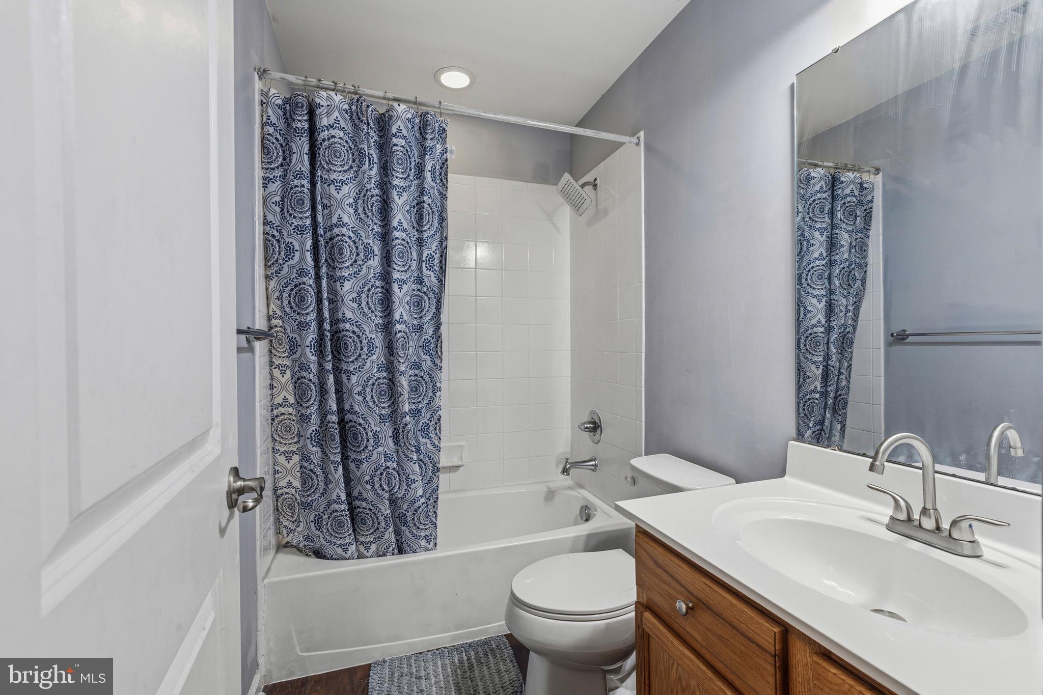 28 Snow Branch Road Clayton, DE 19938 - Photo 28 of 69 a bathroom with a sink toilet and shower