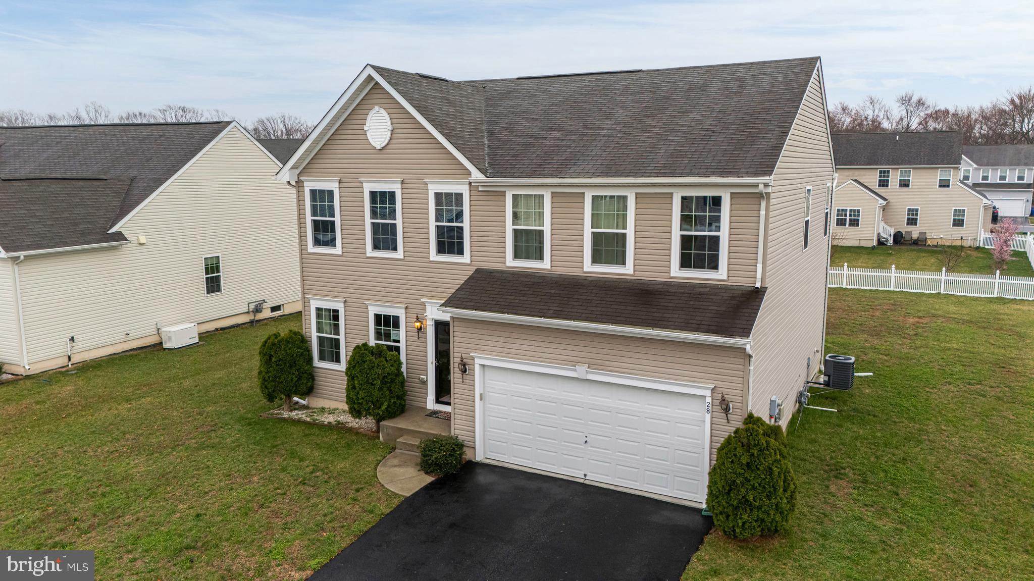 28 Snow Branch Road Clayton, DE 19938 - Photo 36 of 69 a front view of a house with garden