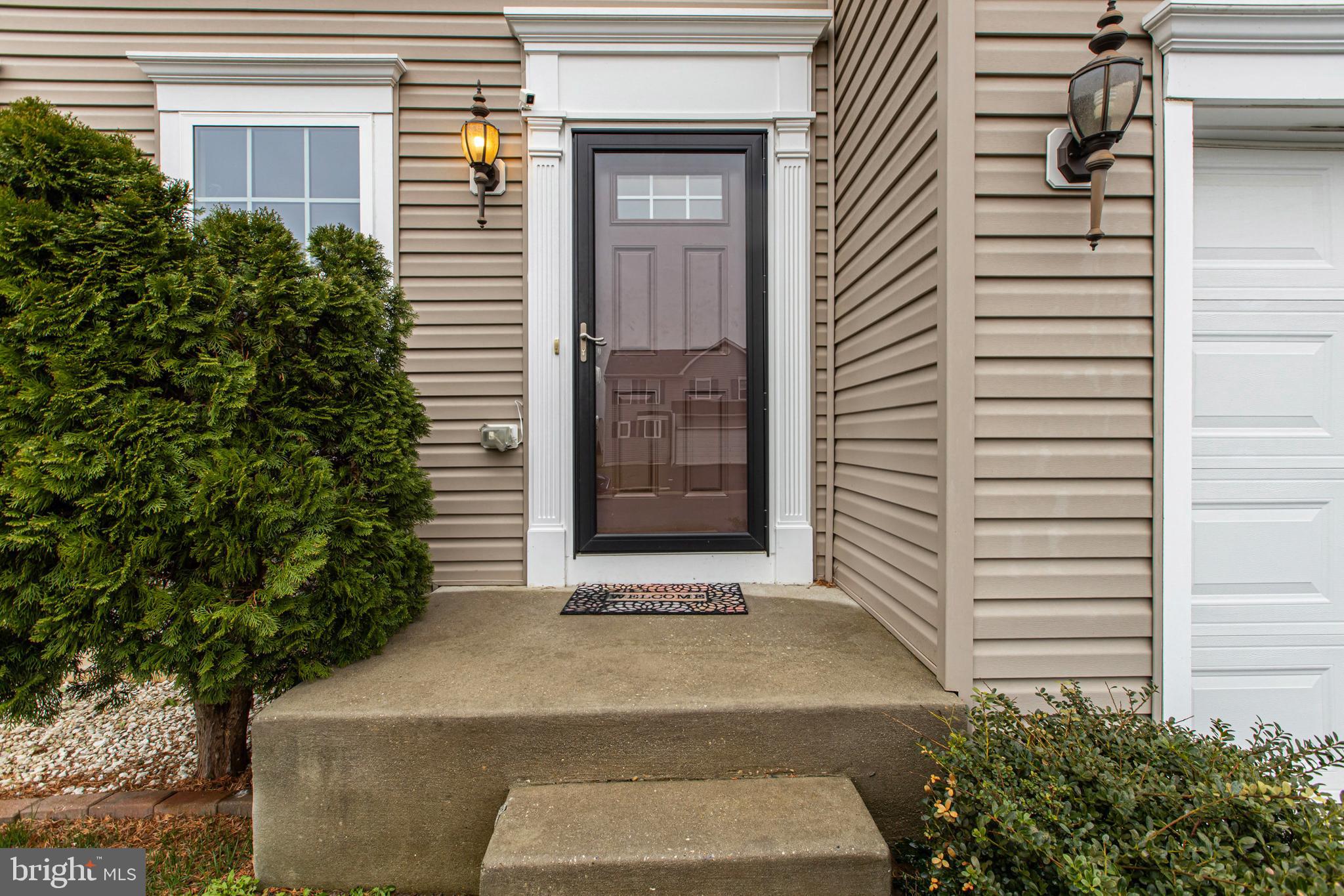 28 Snow Branch Road Clayton, DE 19938 - Photo 6 of 69 a front view of a house with a yard