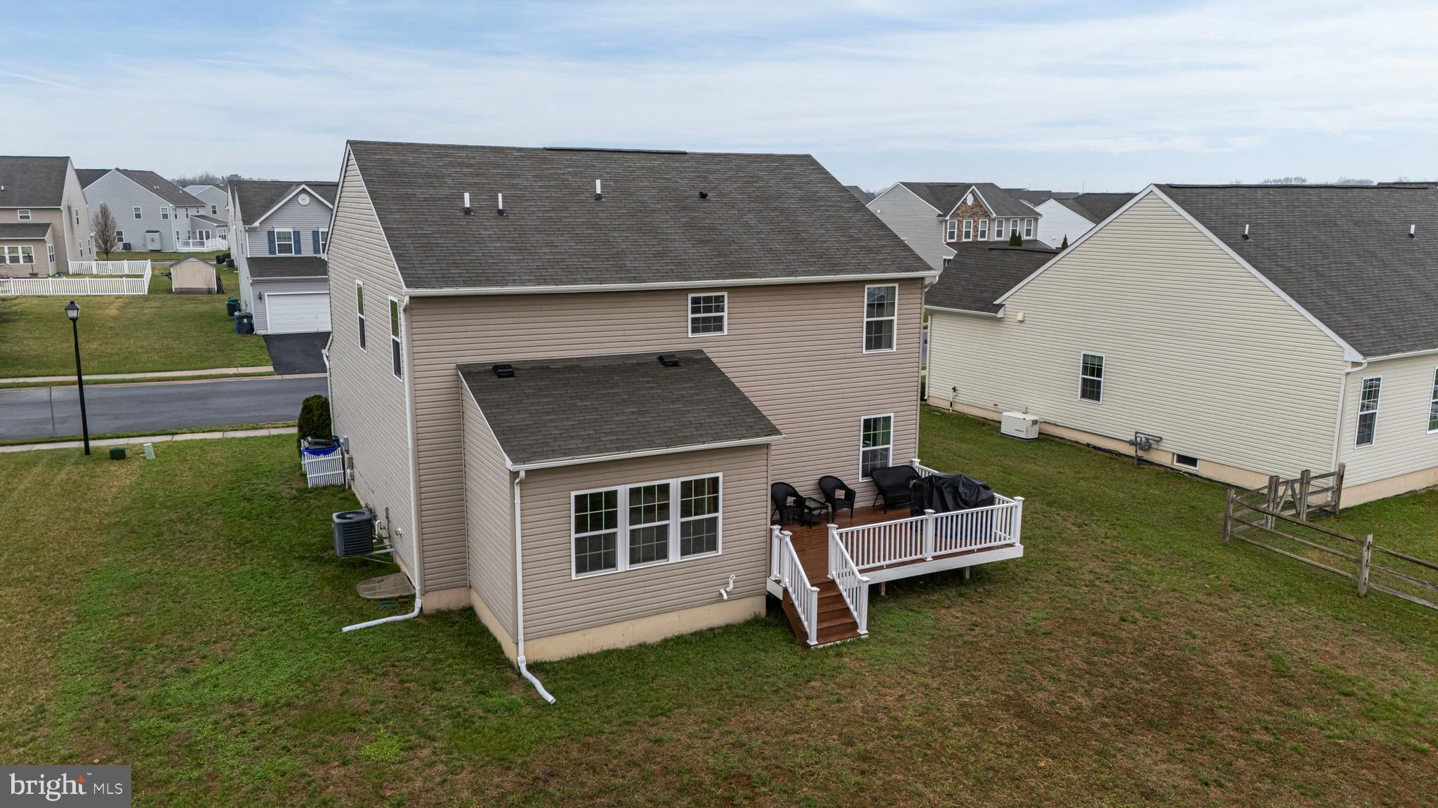 28 Snow Branch Road Clayton, DE 19938 - Photo 69 of 69 a front view of a house with a garden
