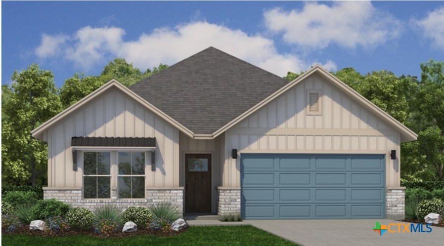 306 Cardinal Dr Port Port Lavaca, TX 77979 - Photo 4 of 16 a front view of a house with a garden