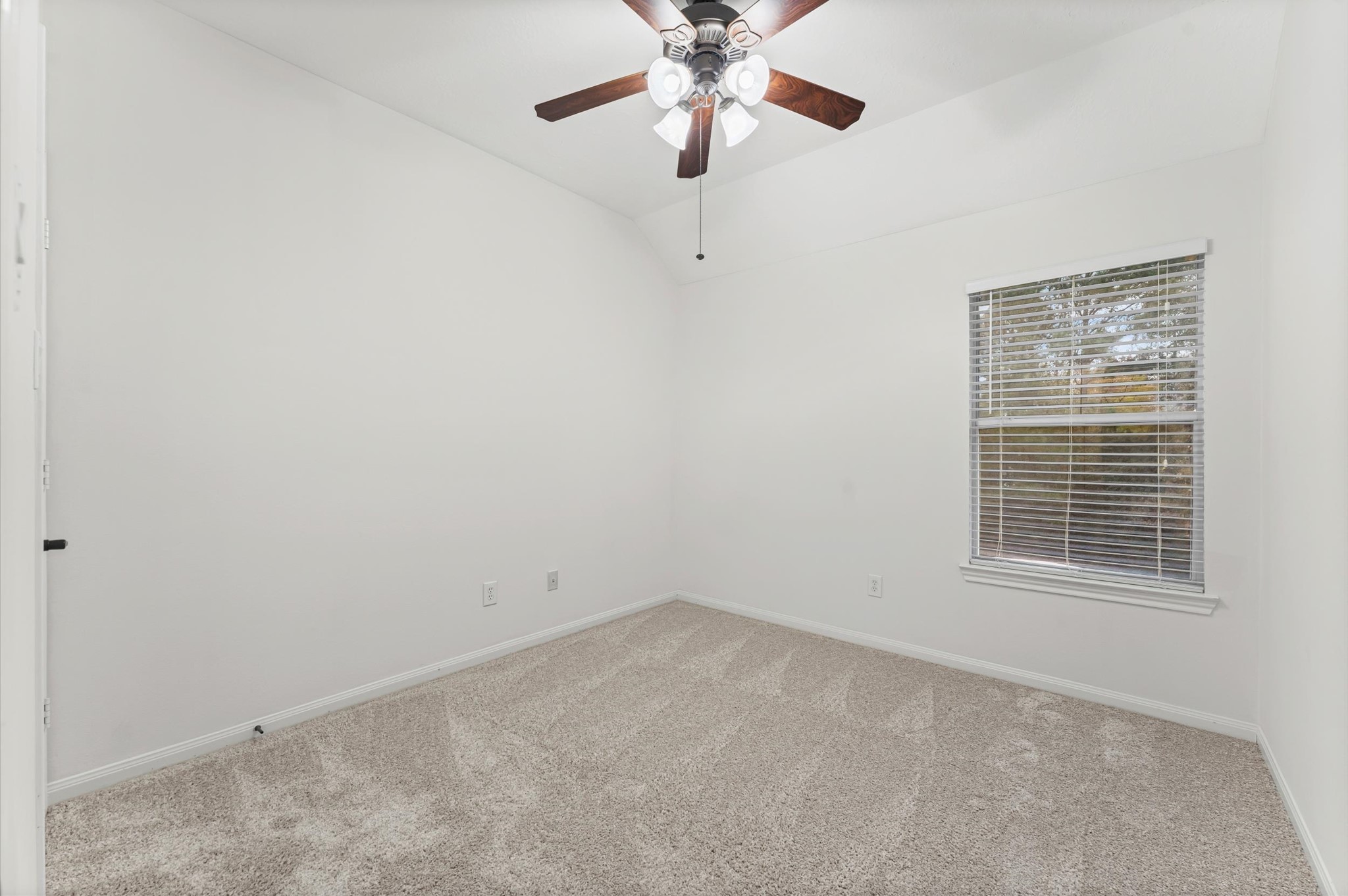 133 East Montfair Boulevard Spring, TX 77382 - Photo 13 of 22 a view of an empty room with a window