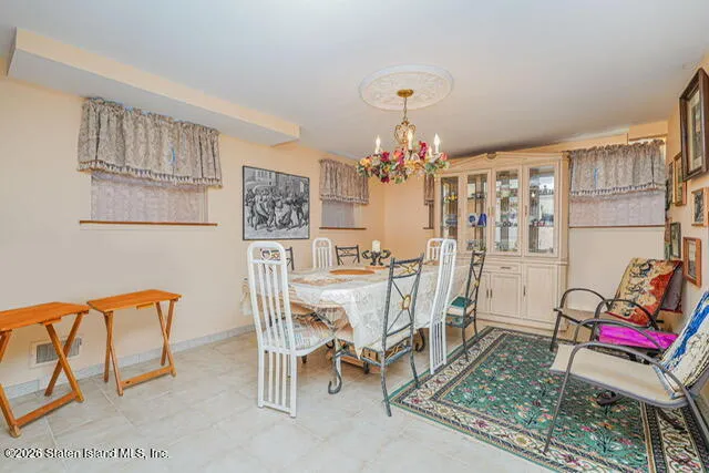 a view of a dining room with furniture