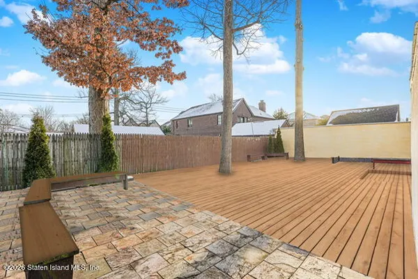 a view of a backyard of the house