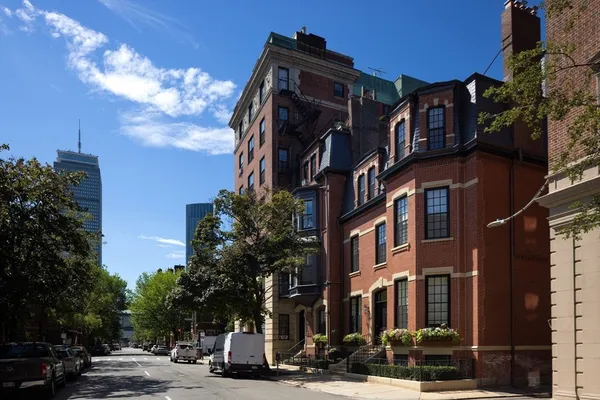 a view of a street with buildings
