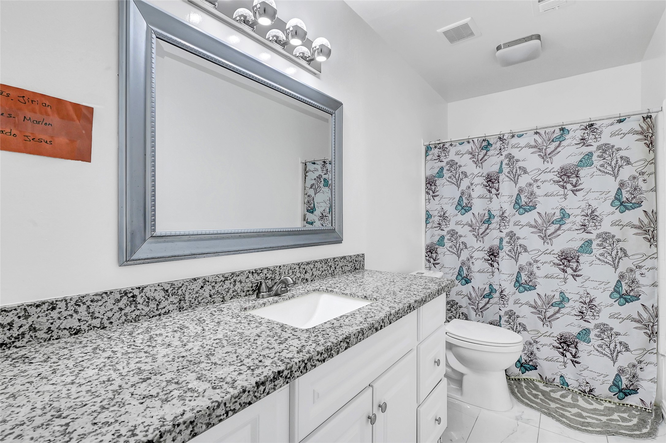 2016 South Houston Road Pasadena, TX 77502 - Photo 18 of 24 a bathroom with a sink and a mirror