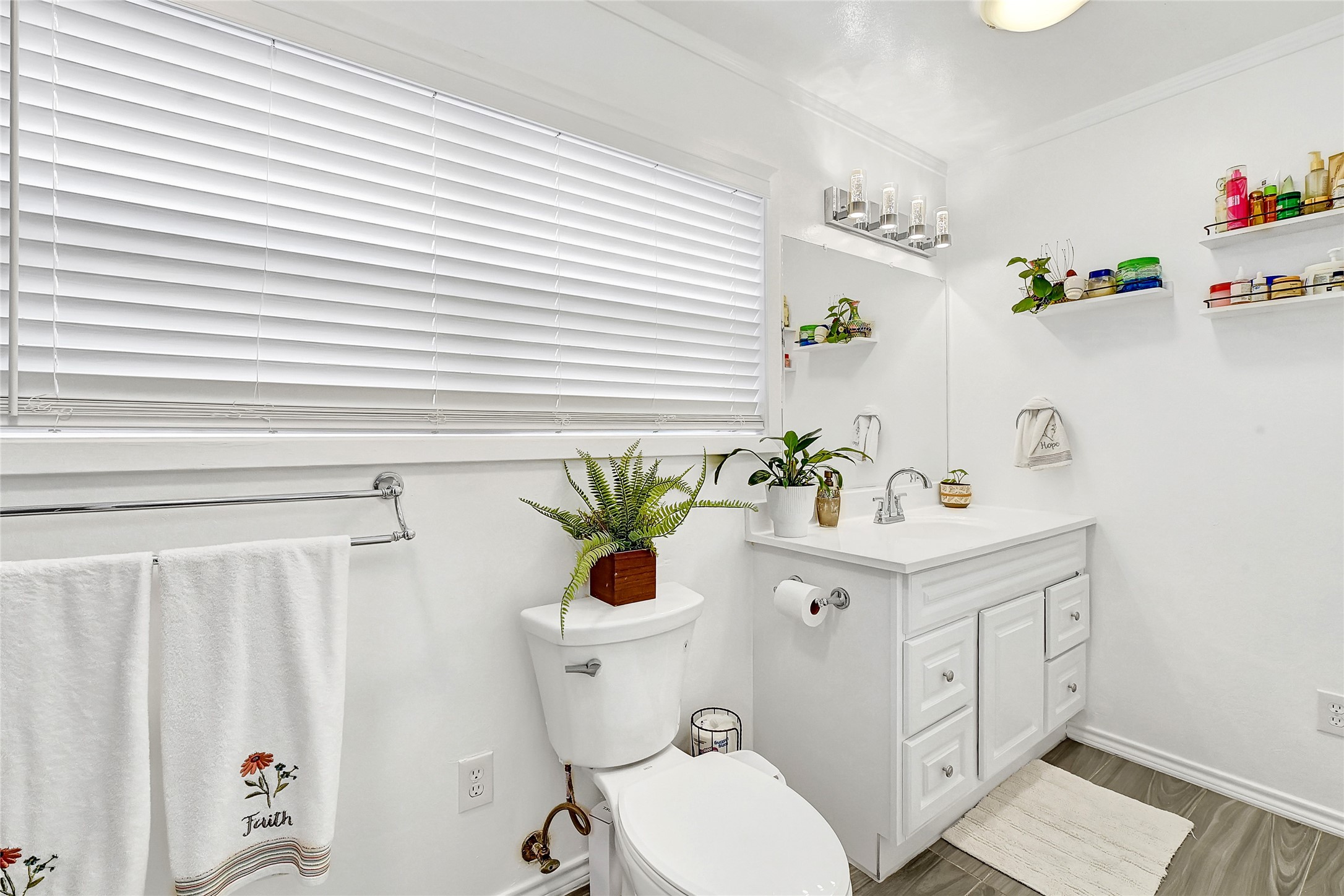 2016 South Houston Road Pasadena, TX 77502 - Photo 20 of 24 a white toilet sitting next to a white sink