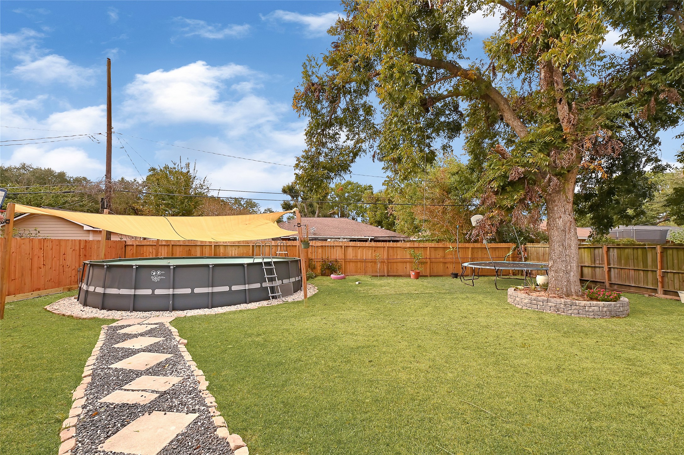 2016 South Houston Road Pasadena, TX 77502 - Photo 23 of 24 a view of a yard with swimming pool