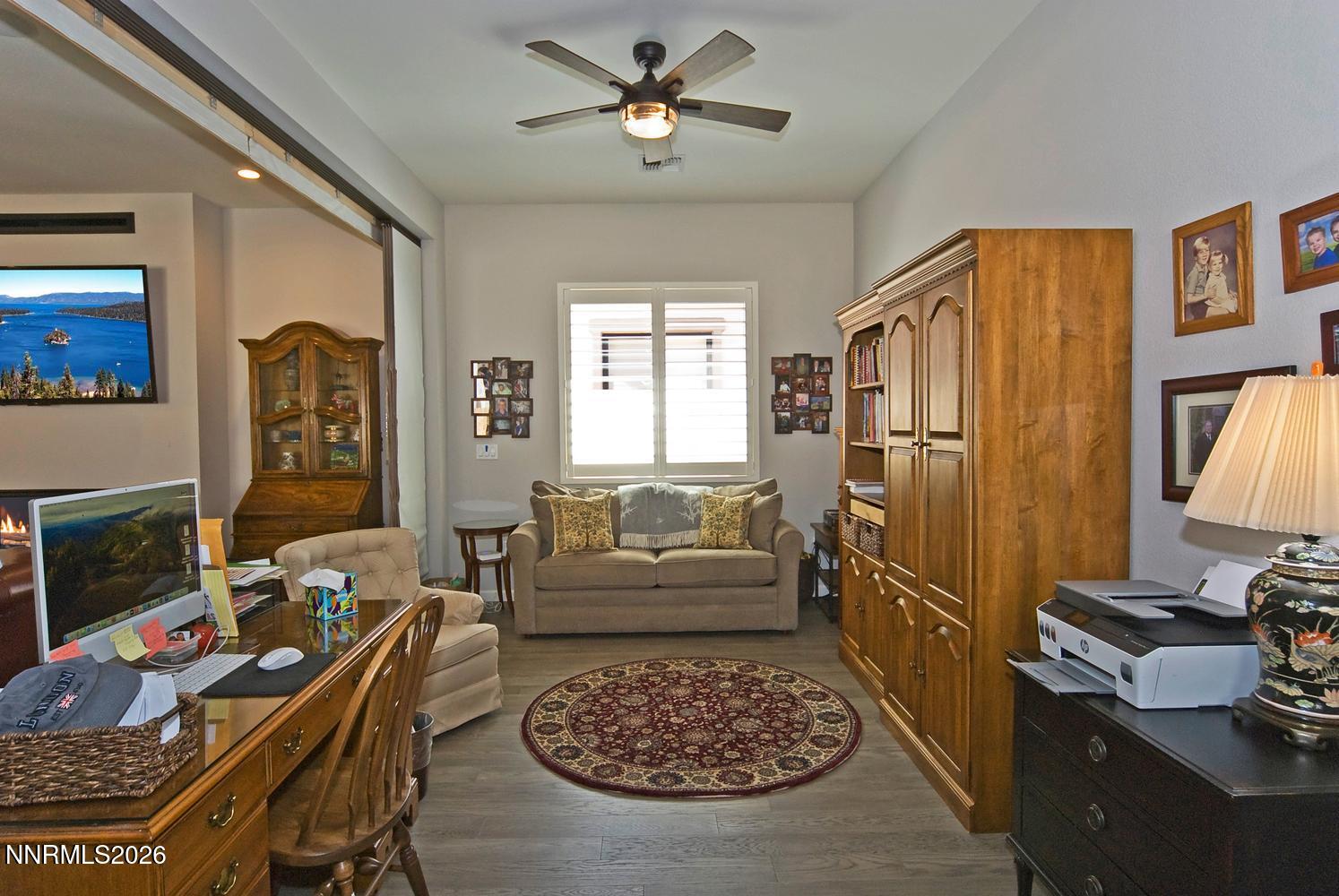 2332 Hammer Falls Drive Reno, NV 89521 - Photo 15 of 57 a living room with furniture rug and window