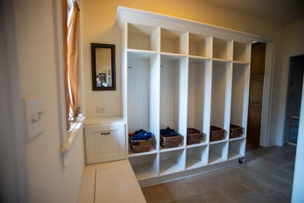 a view of an empty room with stairs