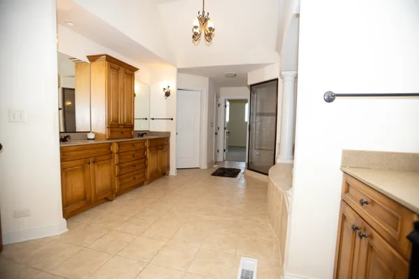 a view of a kitchen with electric appliances