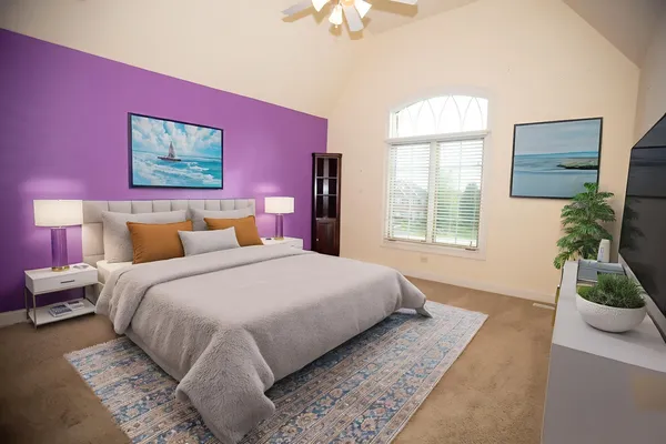 a bedroom with bed and a window