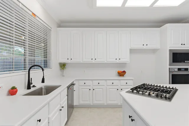 a bathroom with a sink toilet and vanity