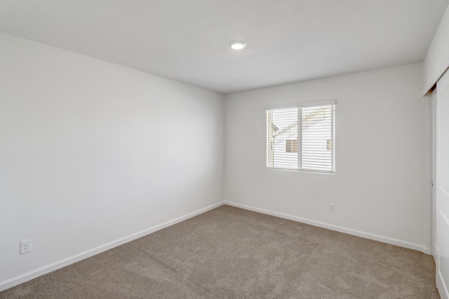 2887 Krone Way Antelope, CA 95843 - Photo 31 of 46 an empty room with a window