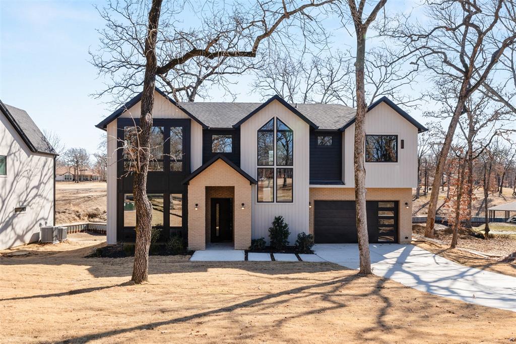 116 Pinnacle Club Drive Mabank, TX 75156 - Photo 1 of 40 a front view of a house with a patio