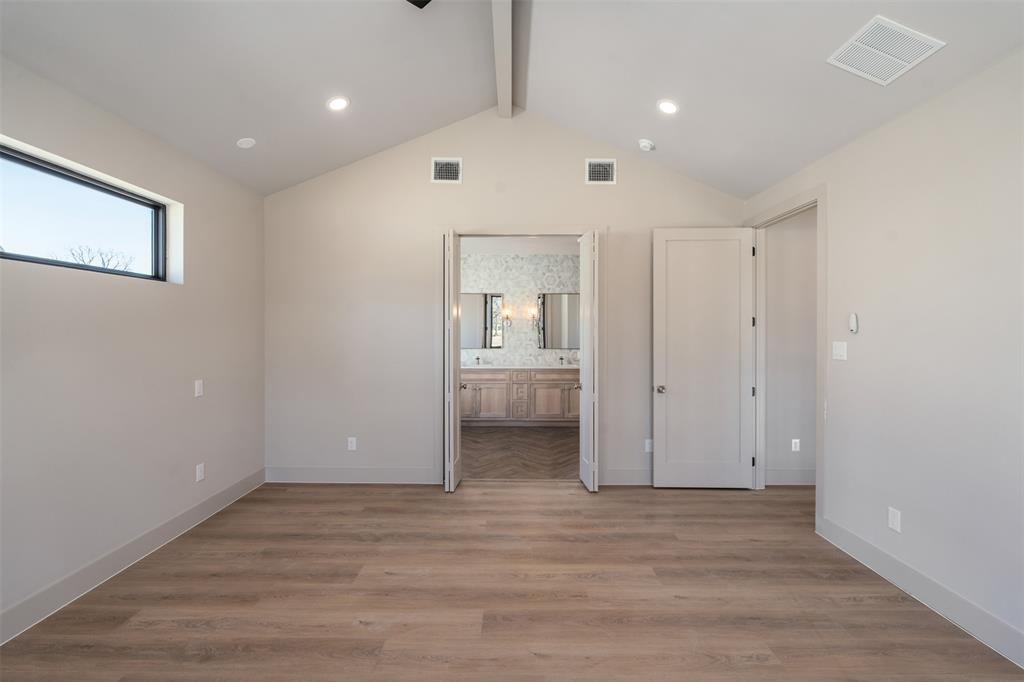 116 Pinnacle Club Drive Mabank, TX 75156 - Photo 19 of 40 an empty room with wooden floor and windows