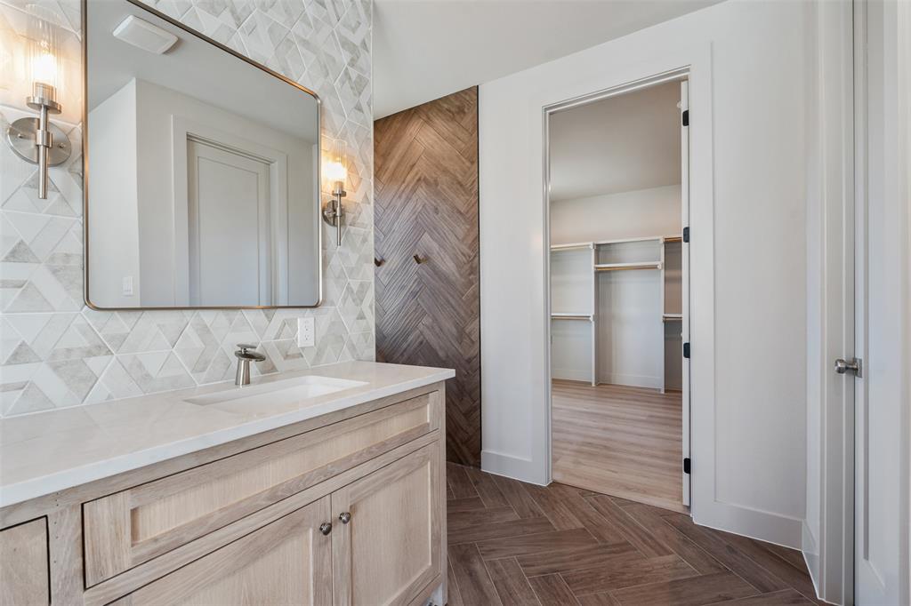 116 Pinnacle Club Drive Mabank, TX 75156 - Photo 24 of 40 a bathroom with a sink and a mirror