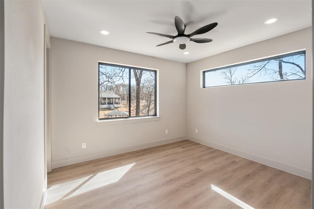 116 Pinnacle Club Drive Mabank, TX 75156 - Photo 27 of 40 a view of an empty room with a window