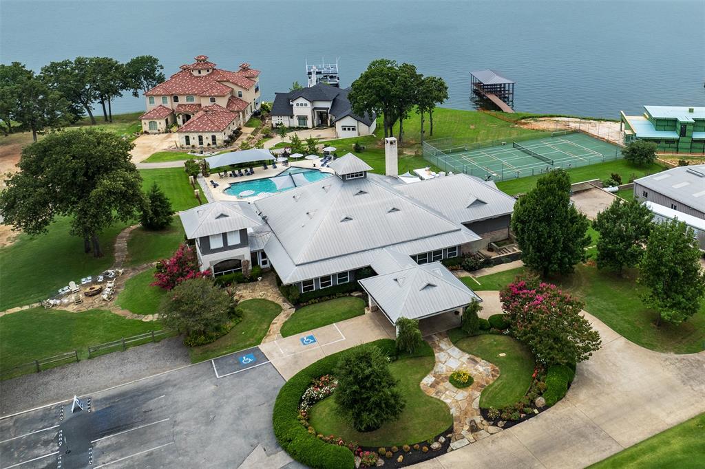 116 Pinnacle Club Drive Mabank, TX 75156 - Photo 35 of 40 an aerial view of a house with a garden and swimming pool