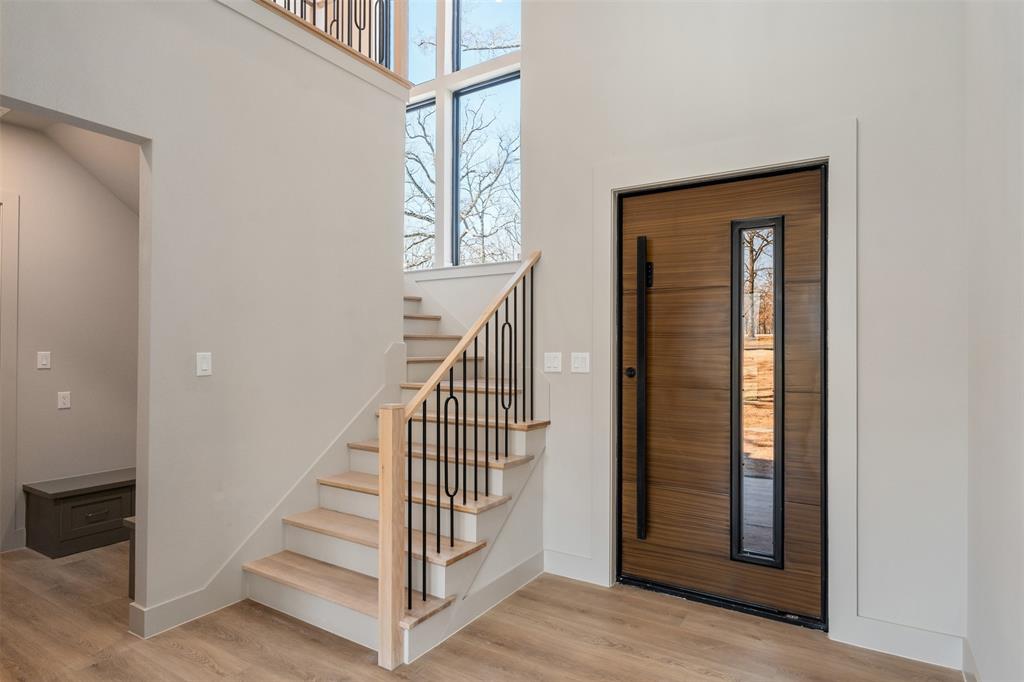 116 Pinnacle Club Drive Mabank, TX 75156 - Photo 5 of 40 a view of entryway and hall with wooden floor