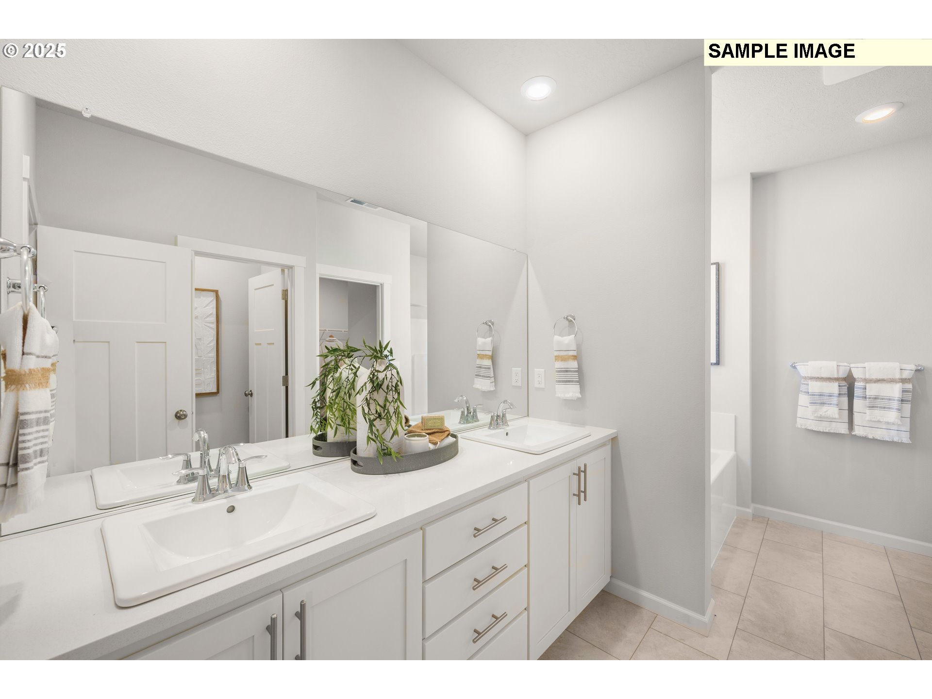 4301 Hackamore Court Southeast Albany, OR 97322 - Photo 14 of 24 a bathroom with a double vanity sink mirror and