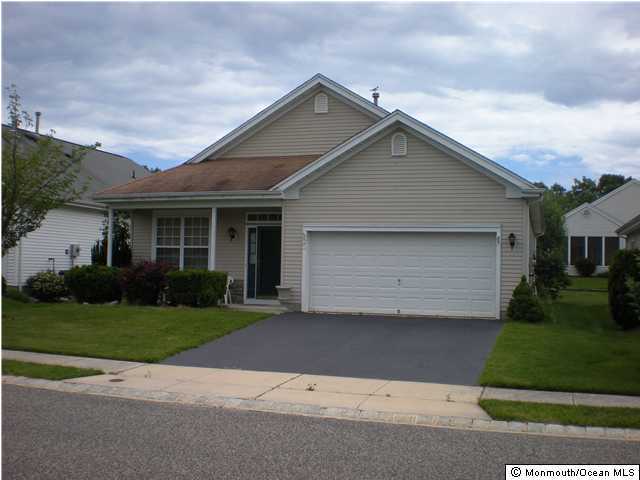 85 Sandpiper Road Barnegat, NJ 08005 - Photo 1 of 3 front view of house with a yard