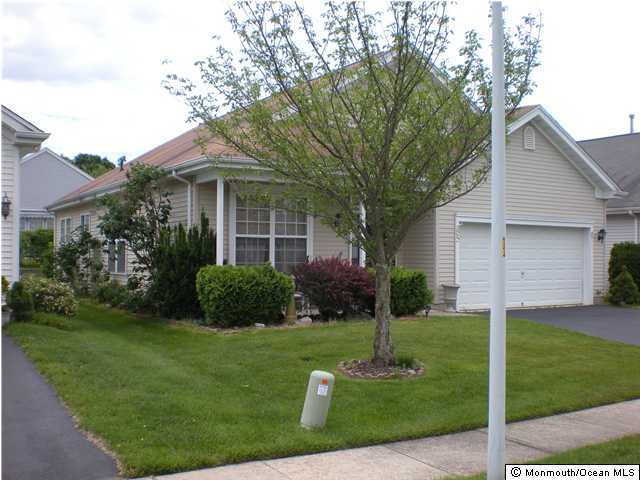 85 Sandpiper Road Barnegat, NJ 08005 - Photo 3 of 3 a front view of a house with a yard
