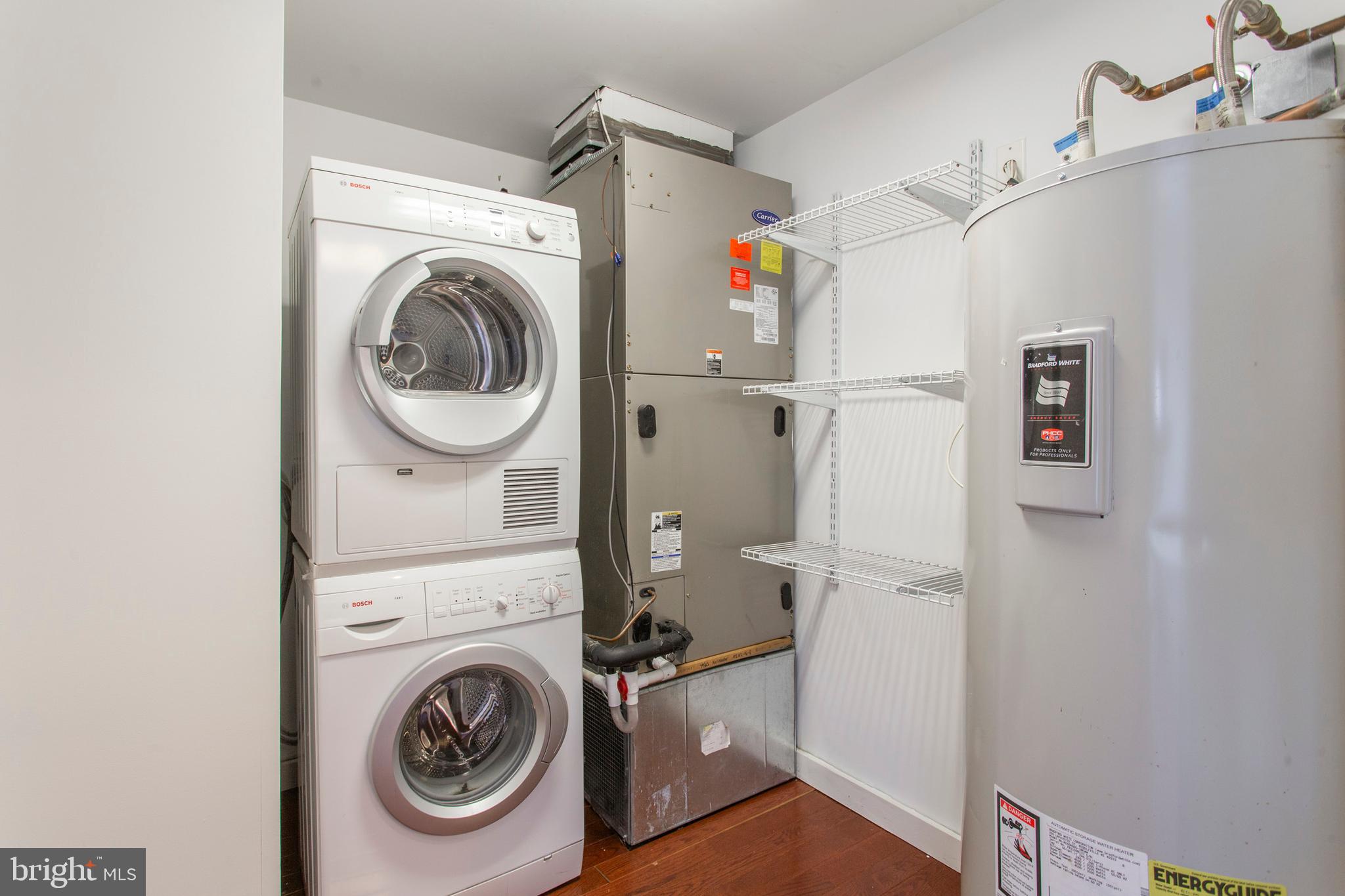 22 North Front Street, Unit PH1 Philadelphia, PA 19106 - Photo 13 of 42 a utility room with dryer and washer
