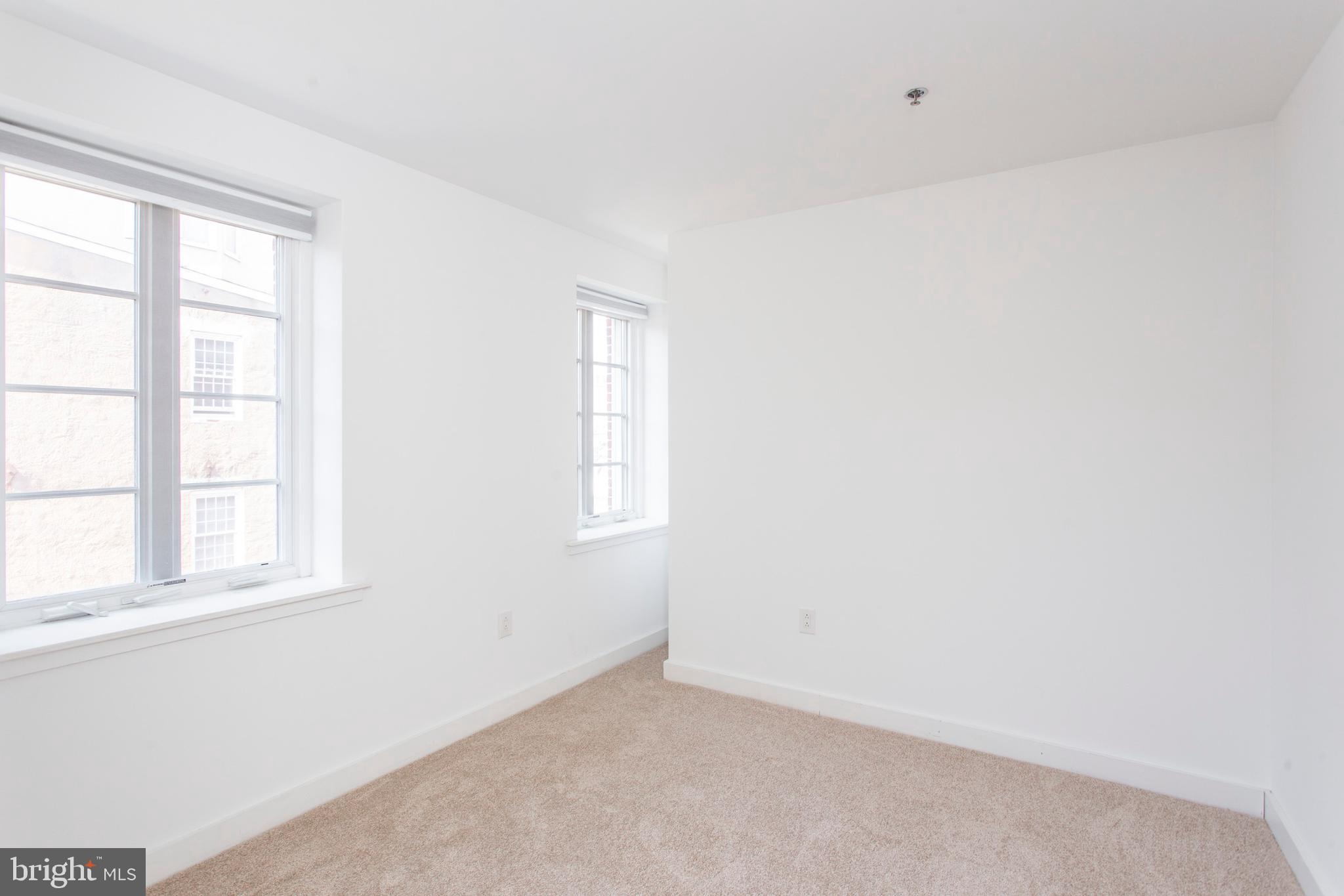 22 North Front Street, Unit PH1 Philadelphia, PA 19106 - Photo 34 of 42 an empty room with a window