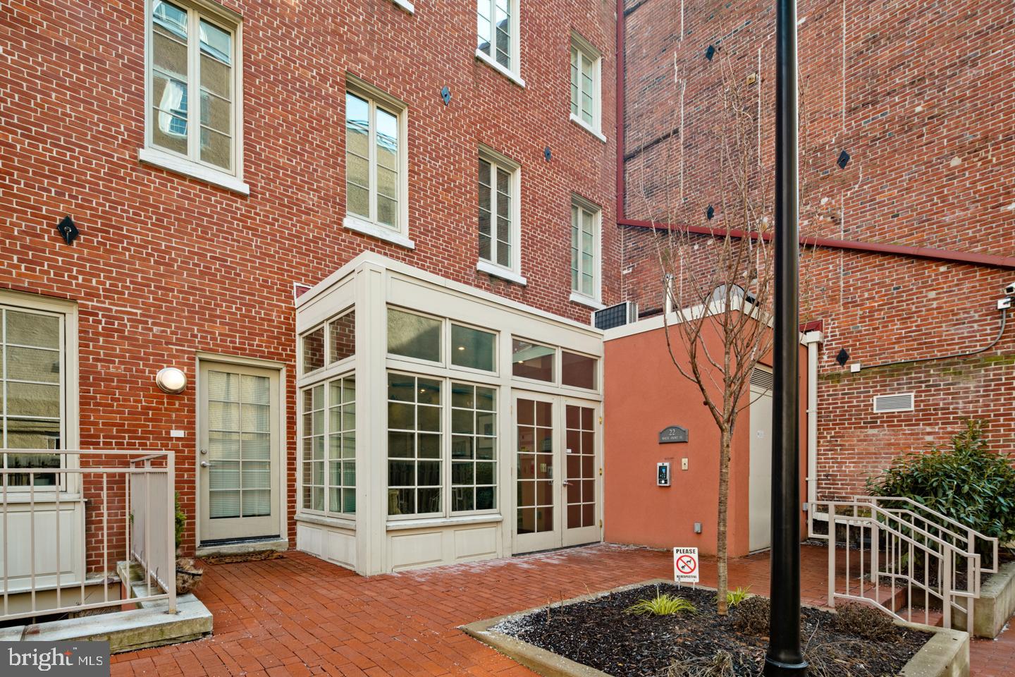 22 North Front Street, Unit PH1 Philadelphia, PA 19106 - Photo 40 of 42 a front view of a building with a garden