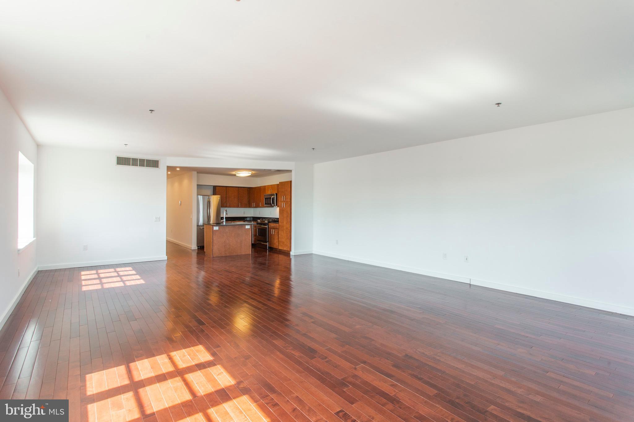 22 North Front Street, Unit PH1 Philadelphia, PA 19106 - Photo 5 of 42 a view of empty room with wooden floor