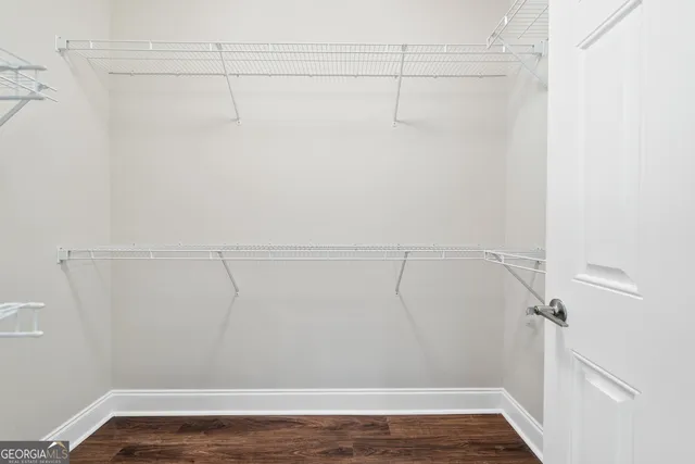 a view of a room with racks on the wall