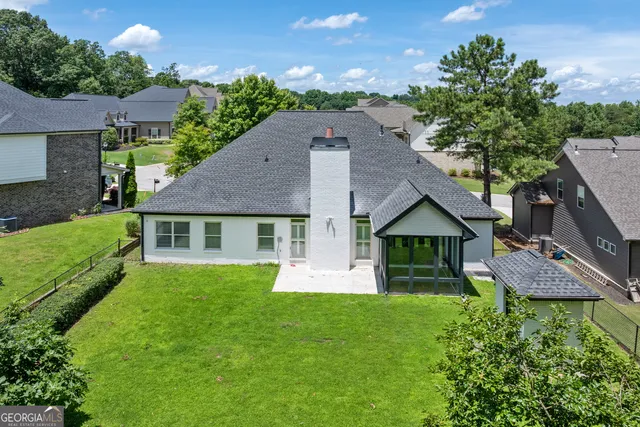 front view of a house with a yard