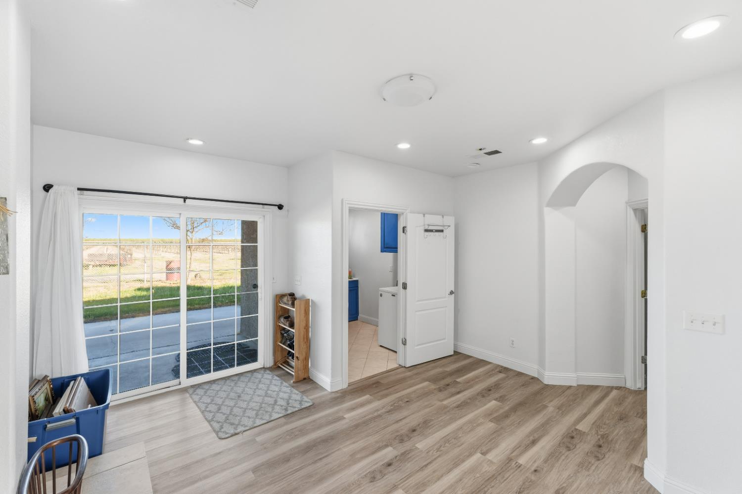 2938 North Trinity Avenue Kerman, CA 93630 - Photo 23 of 38 a view of wooden floor and windows in a room