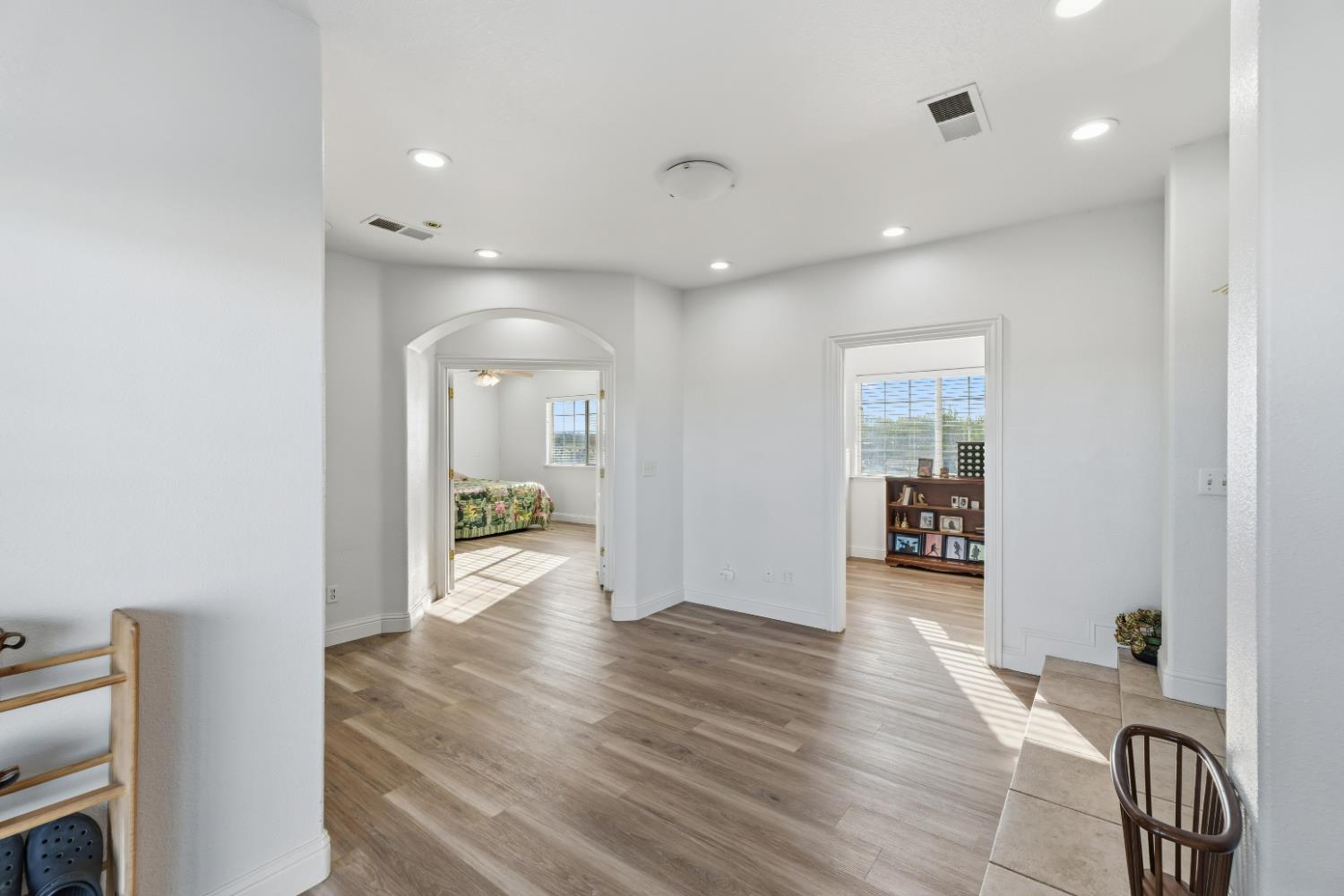 2938 North Trinity Avenue Kerman, CA 93630 - Photo 24 of 38 a view of livingroom with furniture and wooden floor