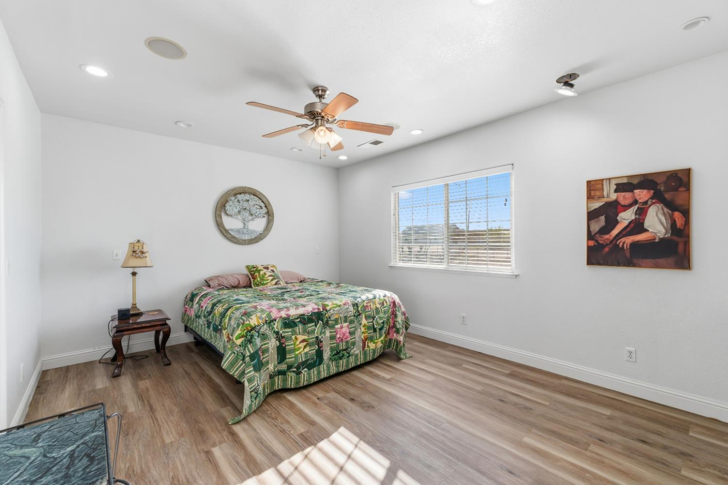 2938 North Trinity Avenue Kerman, CA 93630 - Photo 27 of 38 a living room with furniture and a large window