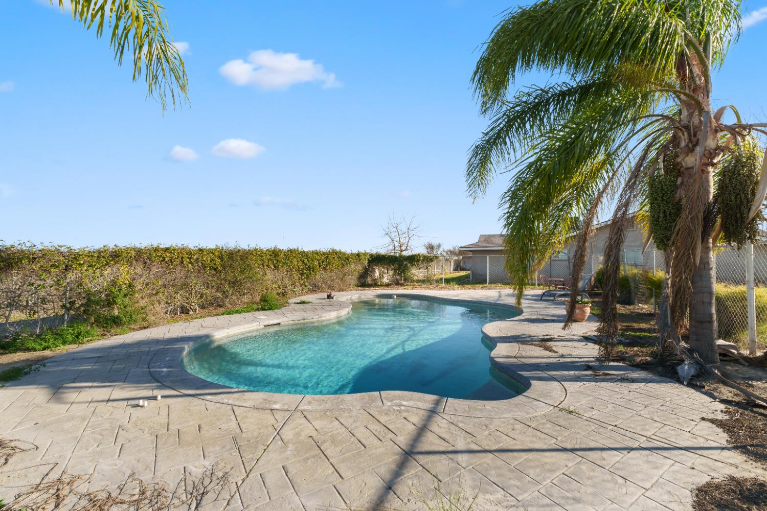 2938 North Trinity Avenue Kerman, CA 93630 - Photo 35 of 38 a view of a lake with a yard
