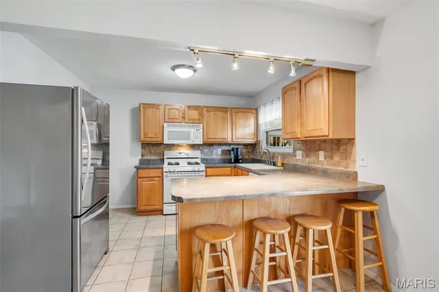 $269,000 | 2639 Glenoak Drive, Maryland Heights, MO 63043