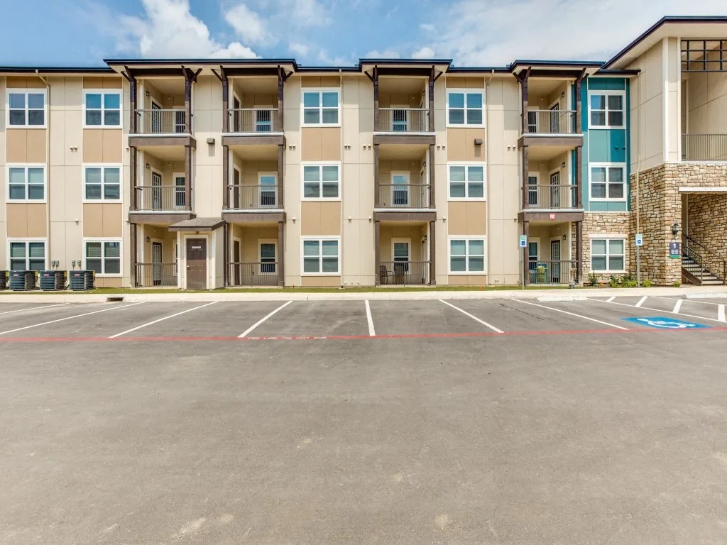 14722 Nacogdoches Road, Unit 4108 San Antonio, TX 78247 - Photo 11 of 22 a front view of a building with a street
