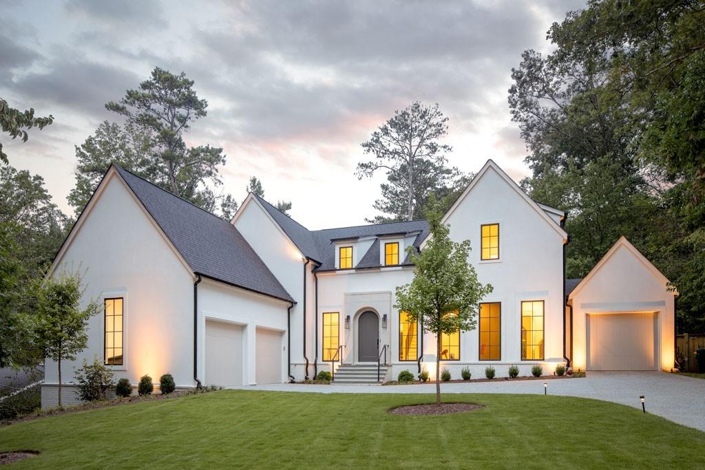 6905 Castleton Drive Northwest Atlanta, GA 30328 - Photo 1 of 1 a front view of house with yard and green space