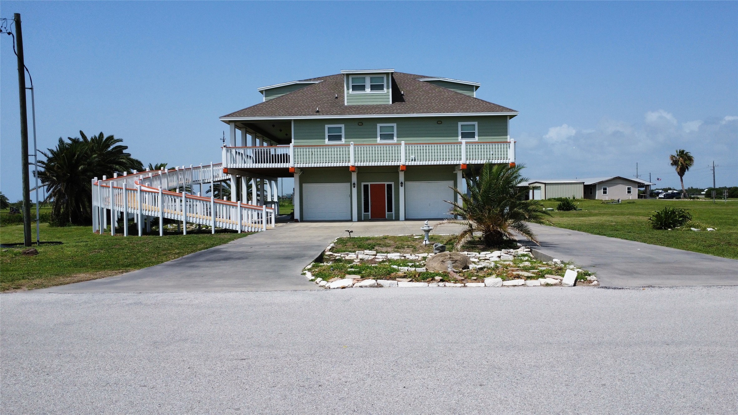 979 Rancho Carribe Drive Crystal Beach, TX 77650 - Photo 5 of 50 Ground level view from the east