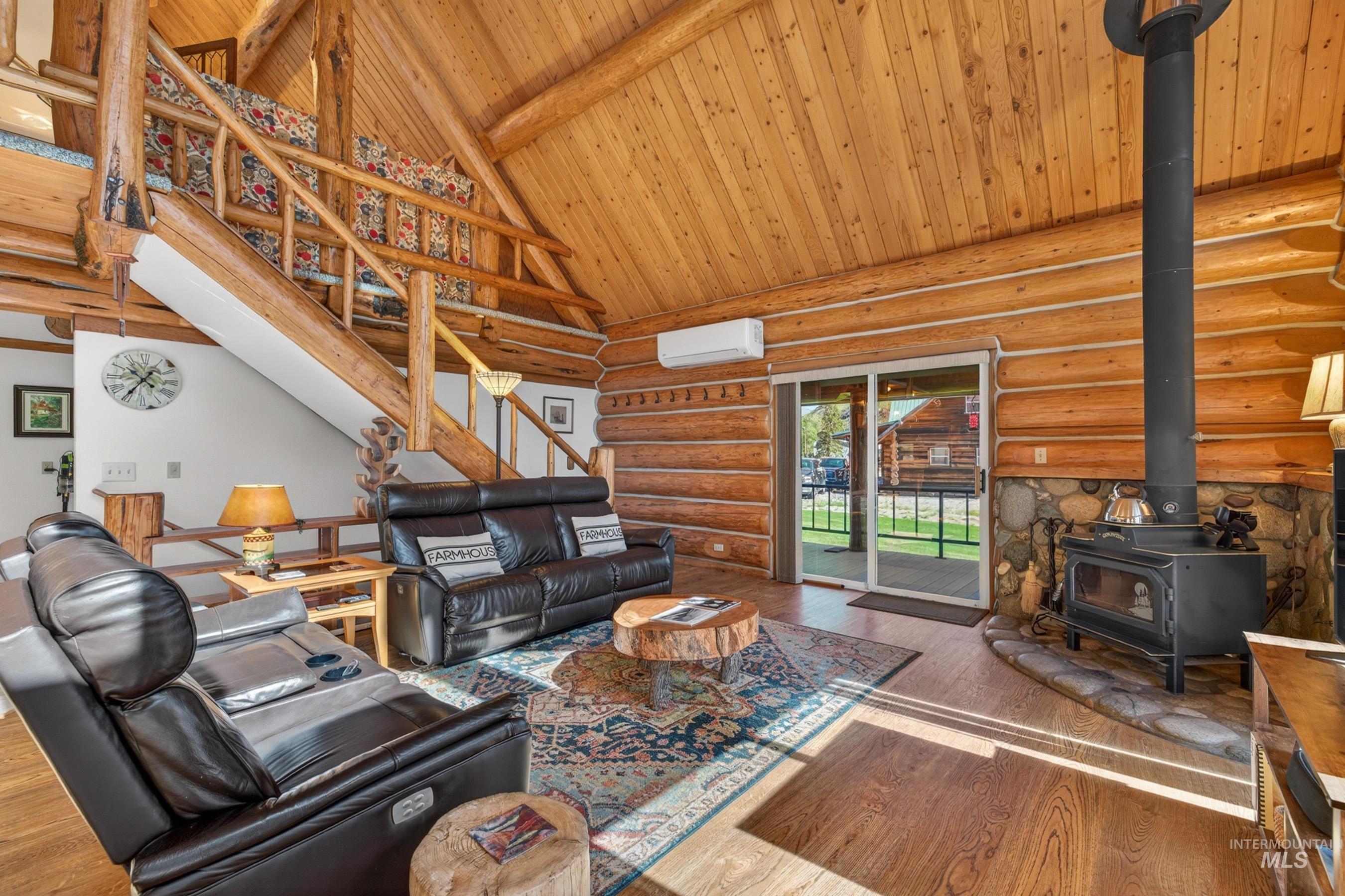 215 Doumecq Road White Bird, ID 83554 - Photo 9 of 50 Log construction interior featuring vaulted wood ceilings and wood-finish flooring