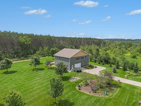 $590,000 | 6836 Wrenwood Drive, Elmira, MI 49730