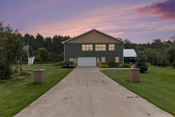 $590,000 | 6836 Wrenwood Drive, Elmira, MI 49730