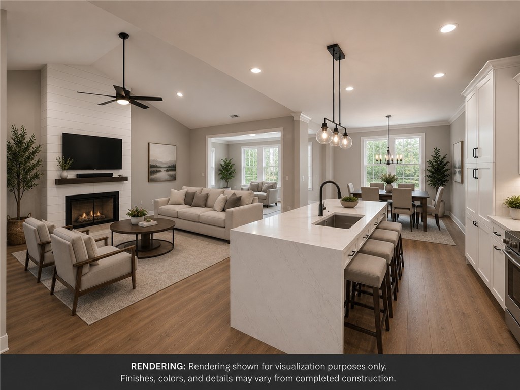 513 Quail Hollow Road Anderson, SC 29621 - Photo 2 of 39 This luminous open concept space seamlessly blends living, dining, and kitchen areas.