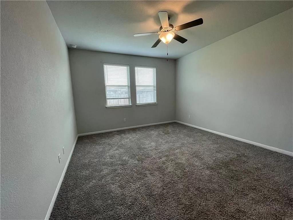 317 Serpens Street Georgetown, TX 78628 - Photo 11 of 13 an empty room with a window