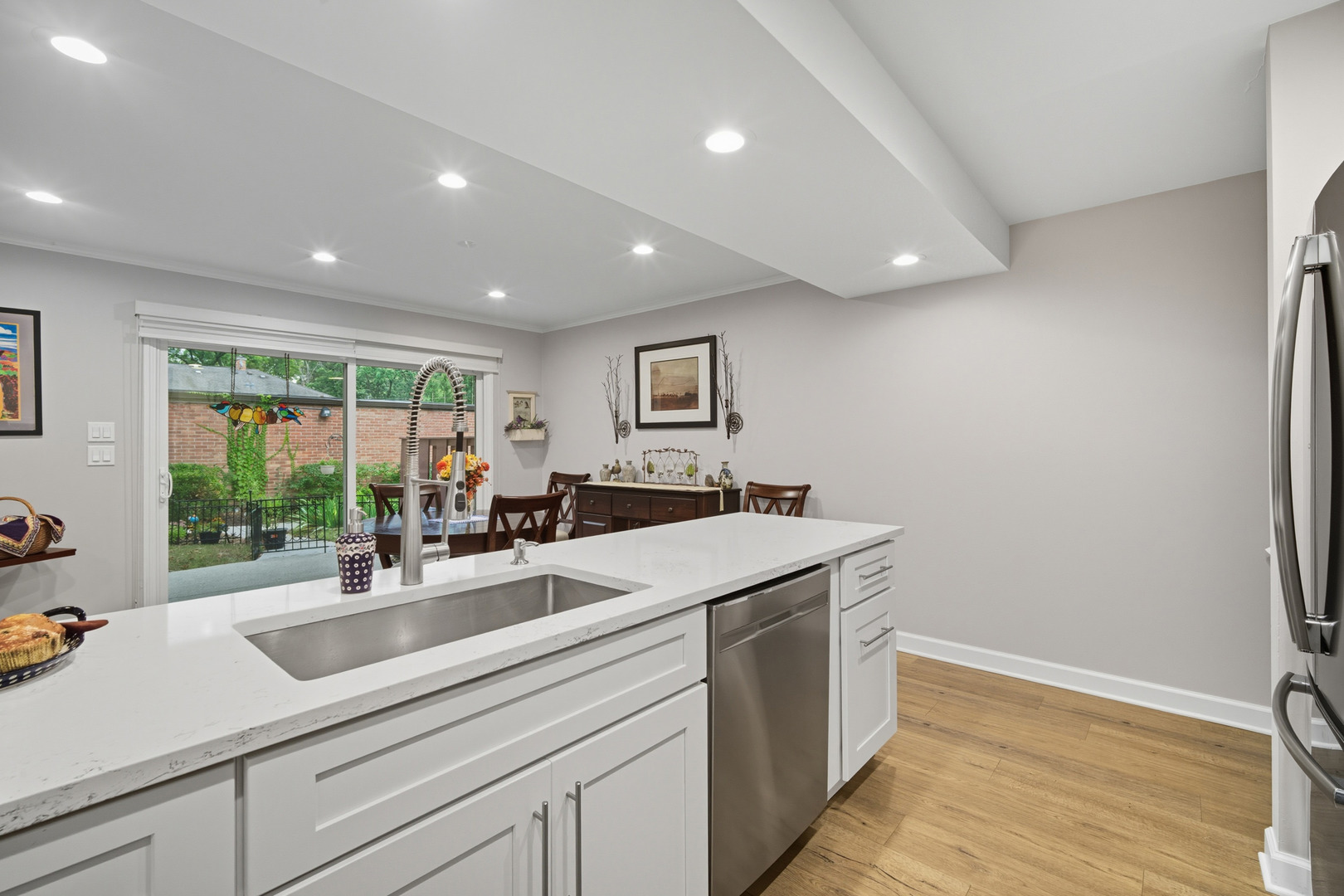 645 Spring Road Glenview, IL 60025 - Photo 17 of 31 a kitchen with a sink and a window