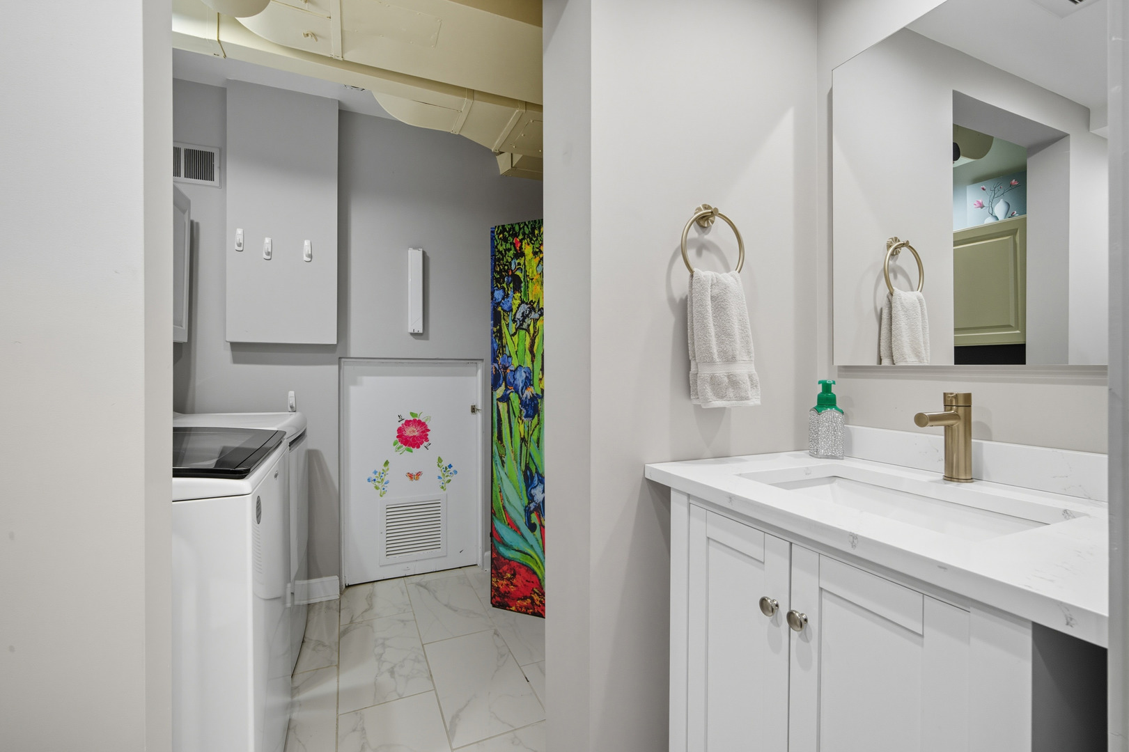 645 Spring Road Glenview, IL 60025 - Photo 20 of 31 a bathroom with a sink vanity and mirror