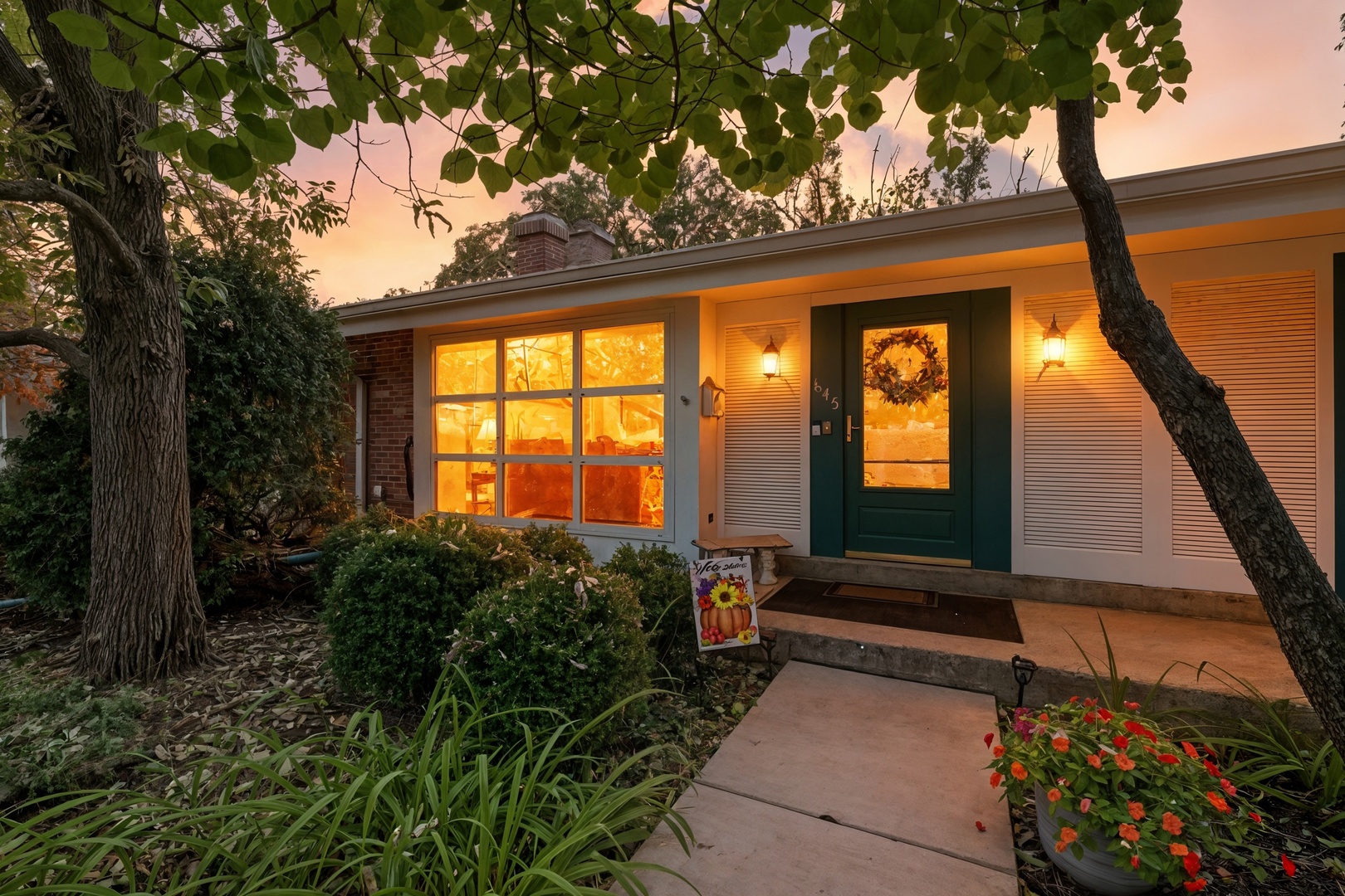 645 Spring Road Glenview, IL 60025 - Photo 2 of 31 a roof deck with table and garden view