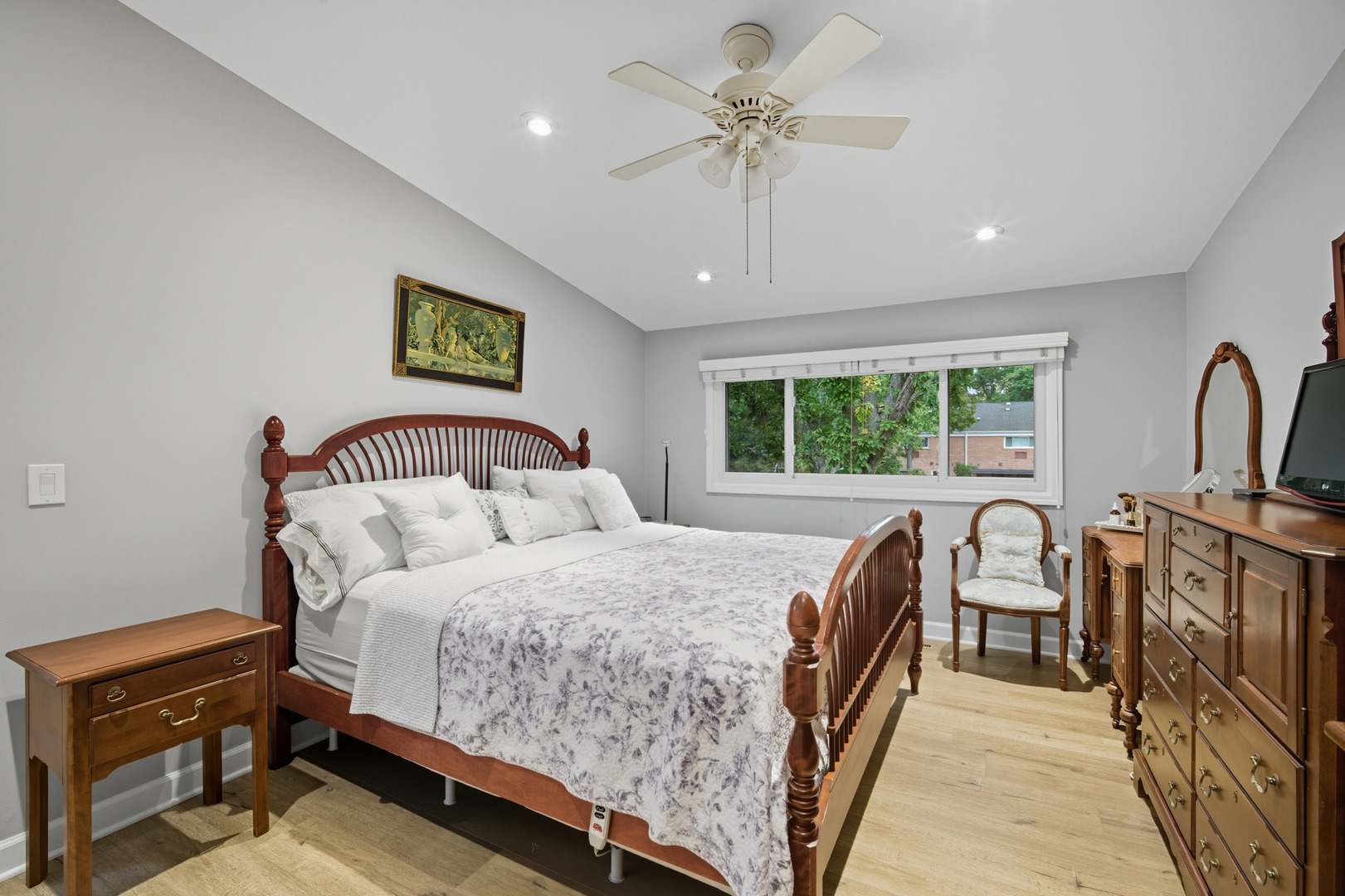 645 Spring Road Glenview, IL 60025 - Photo 24 of 31 a bedroom with a large bed and a window